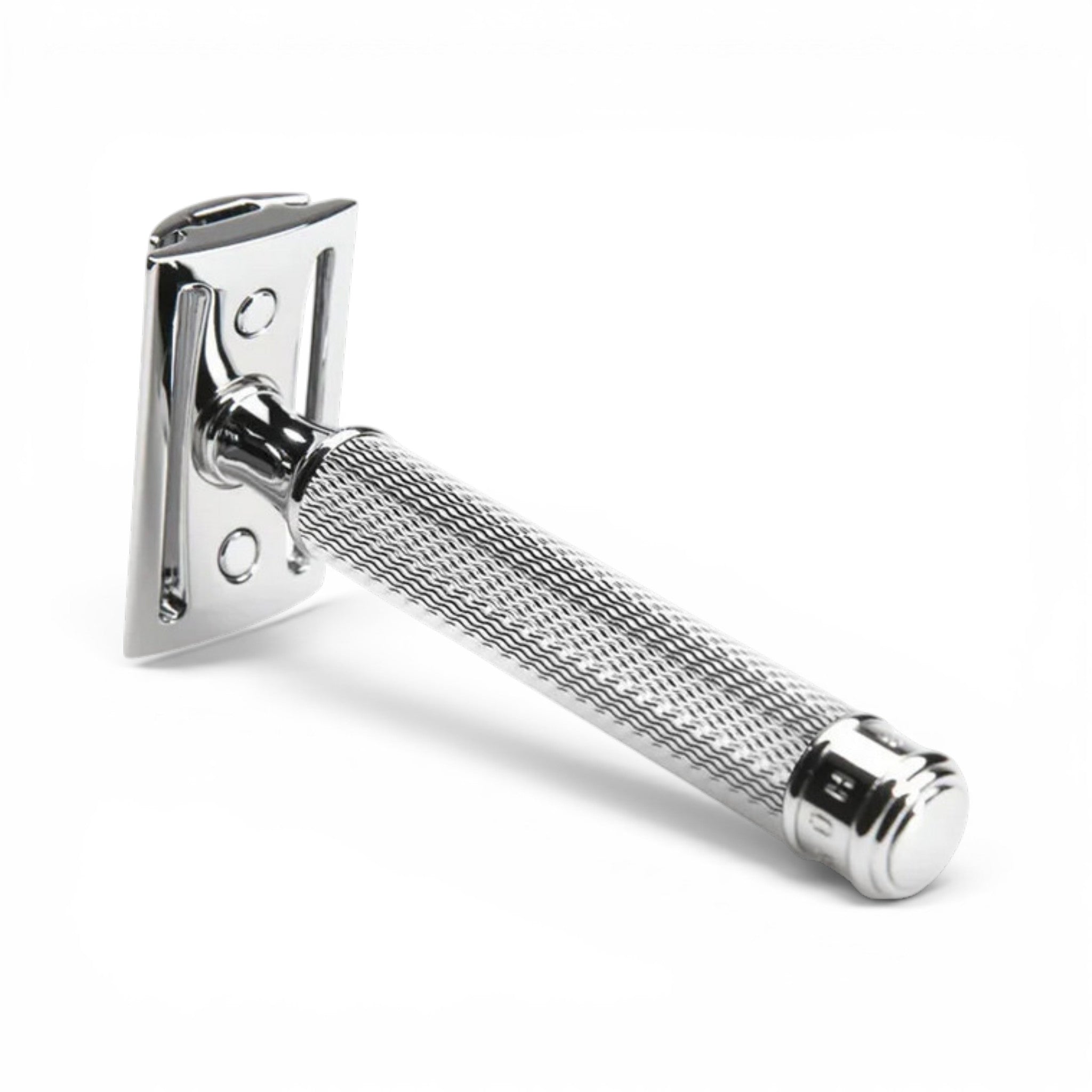 Angled view of MÜHLE R89 chrome safety razor showing textured handle and closed comb head
