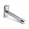 Angled view of MÜHLE R89 chrome safety razor showing textured handle and closed comb head