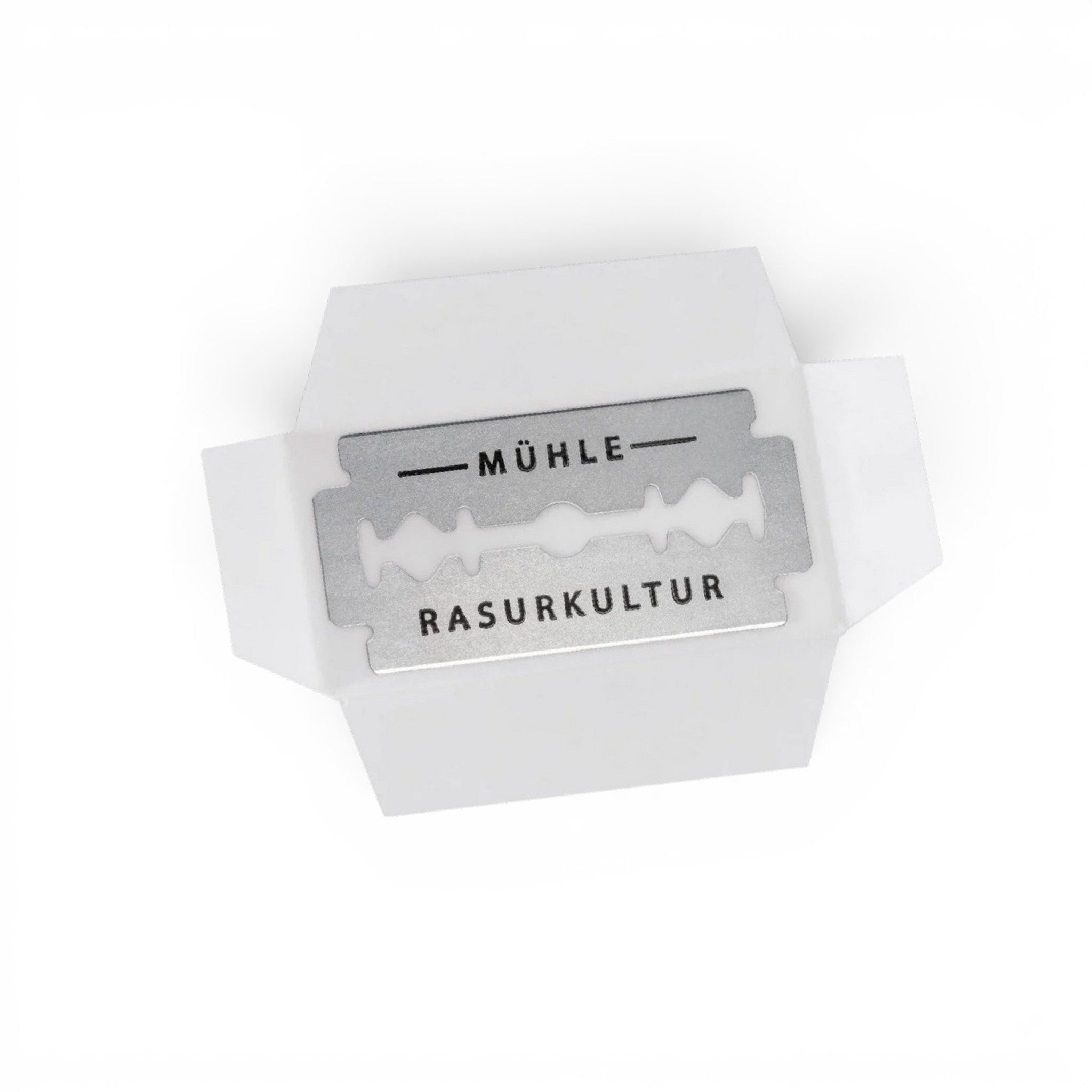 Single MÜHLE stainless steel double edge razor blade on white background