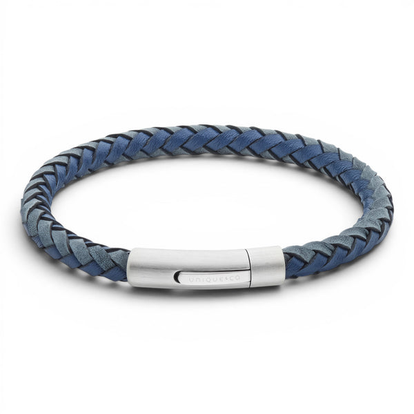 Navy and antique blue braided leather bracelet with stainless steel clasp on a white background