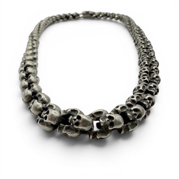 Oxidised skull necklace arranged in natural shape showing thickness and finish