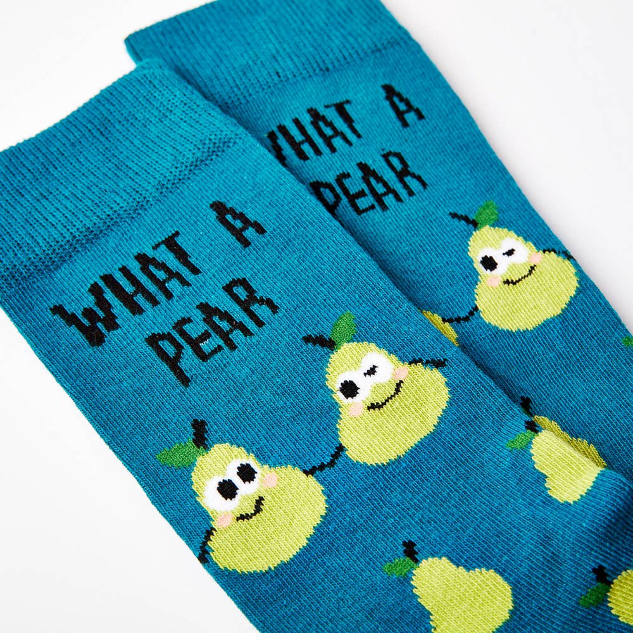 close up of What A Pear socks showing pear design and text
