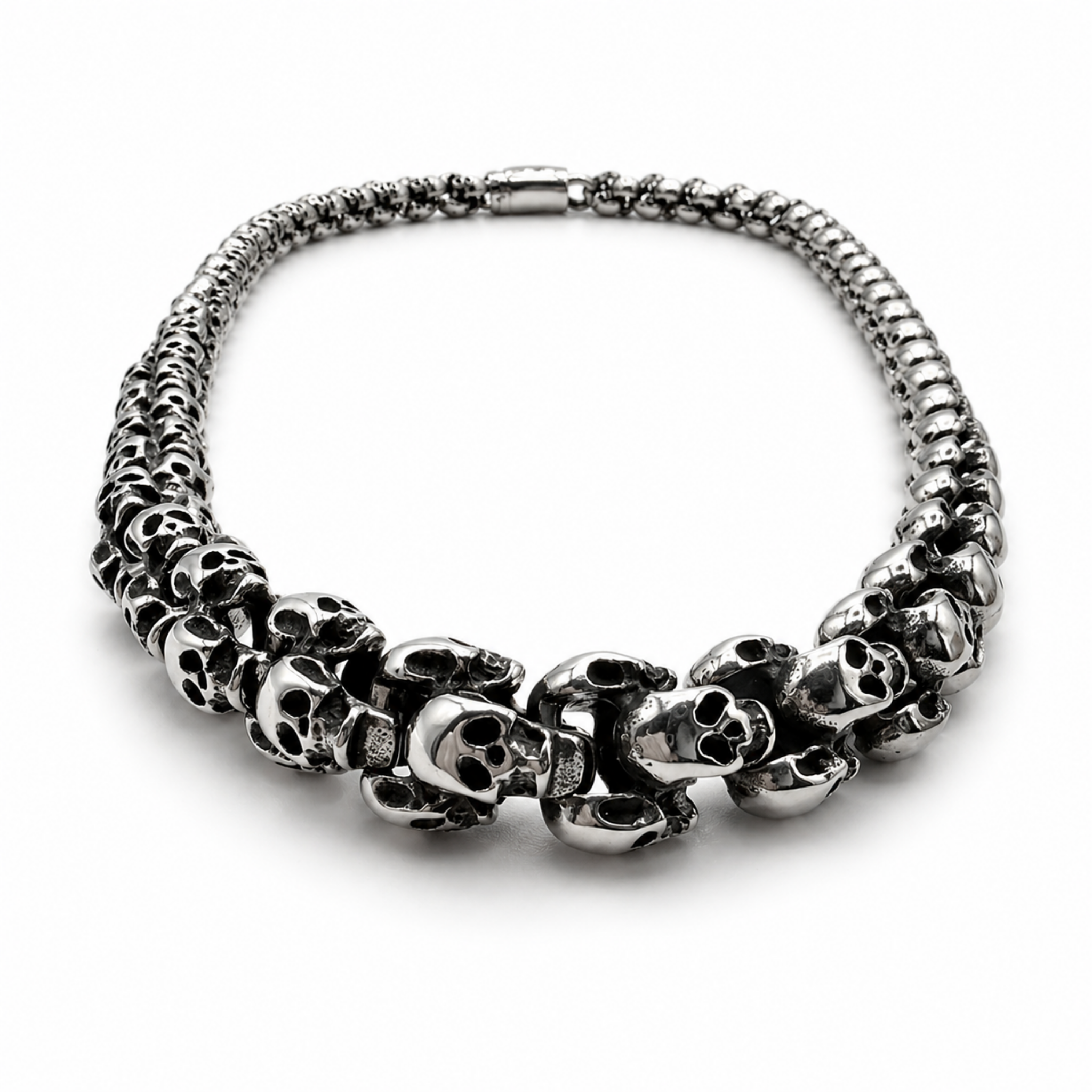 Front view of polished skull link necklace showing interlocking skull design