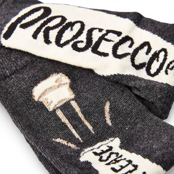close up of prosecco please slogan on novelty socks
