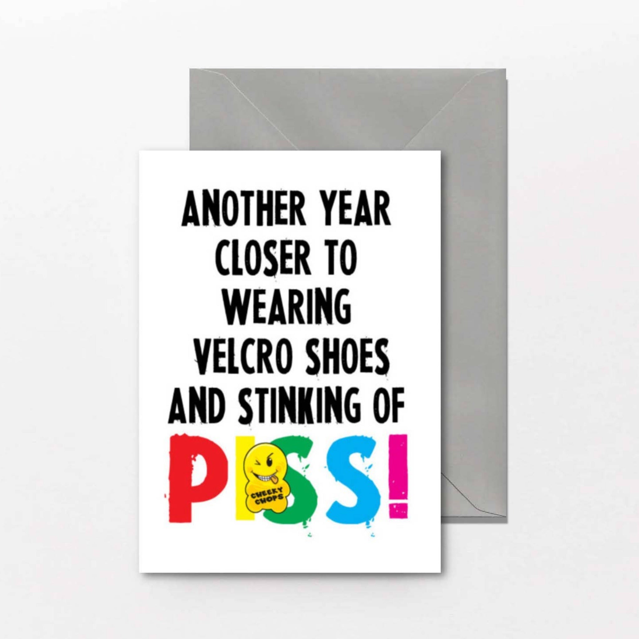 Rude birthday card reading Another Year Closer to Wearing Velcro Shoes and Stinking of Piss