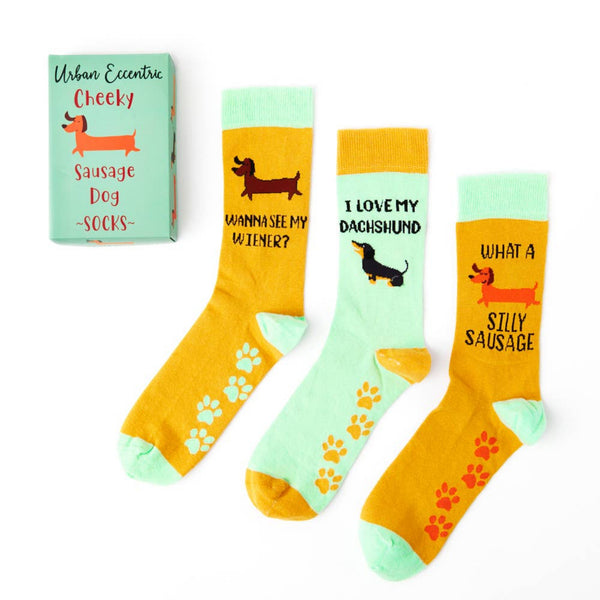 three pairs of sausage dog novelty socks laid flat showing full designs