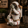 See No Evil astronaut chimpanzee resin ornament in rustic man cave setting
