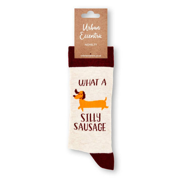 What a silly sausage novelty socks in retail packaging
