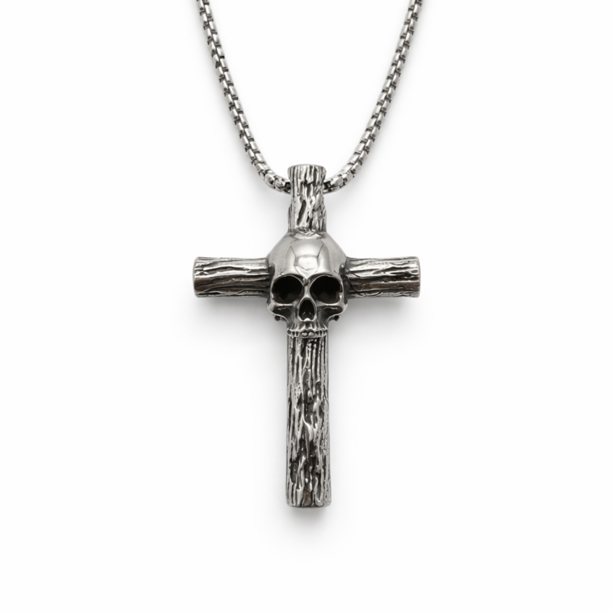 Stainless steel skull cross necklace with 3mm box chain on a clean white background with soft shadow, front view showing detailed skull centre and textured cross