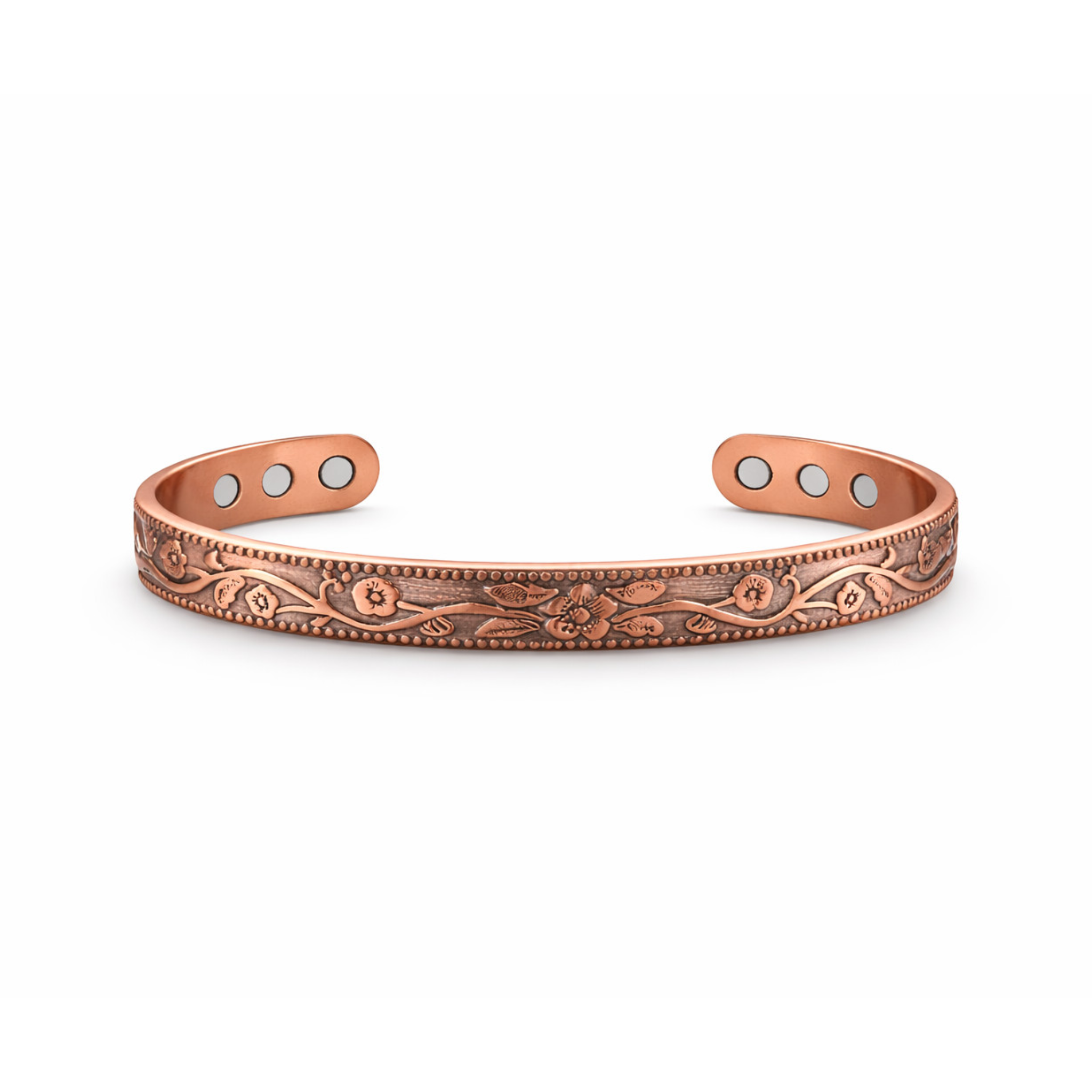 Slim copper magnetic cuff bracelet with raised flower pattern on white background