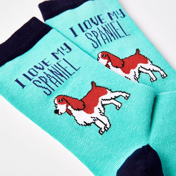Close up of turquoise spaniel socks showing I love my spaniel text and dog design