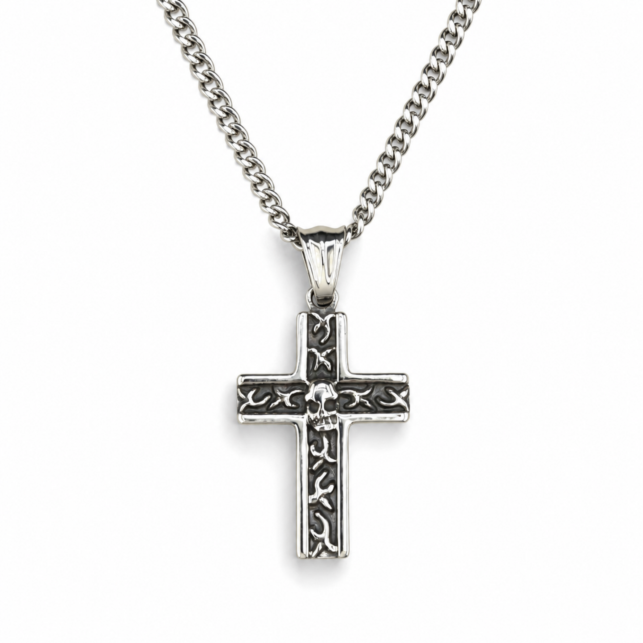 Stainless steel skull cross pendant with engraved detailing on a 20 inch curb chain