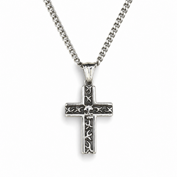 Stainless steel skull cross pendant with engraved detailing on a 20 inch curb chain