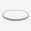 Low angle view of stainless steel 2mm rounded box chain necklace showing thickness and profile