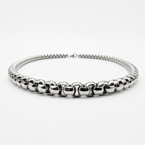 Low angle view of stainless steel 5mm rounded box chain necklace showing thickness and profile