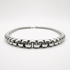 Low angle view of stainless steel 6mm rounded box chain necklace showing thickness and profile