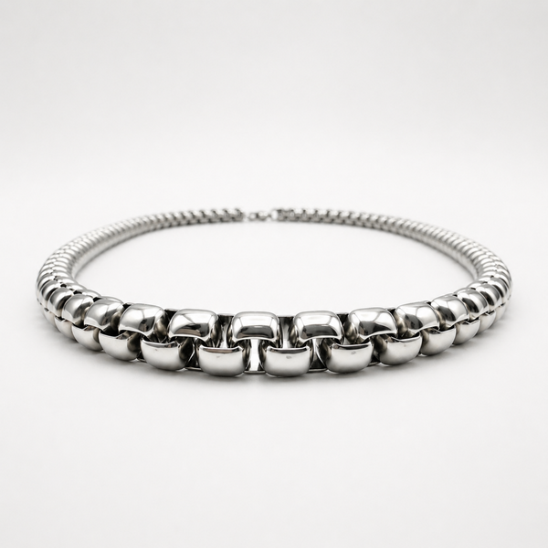 Low angle view of stainless steel 6mm rounded box chain necklace showing thickness and profile