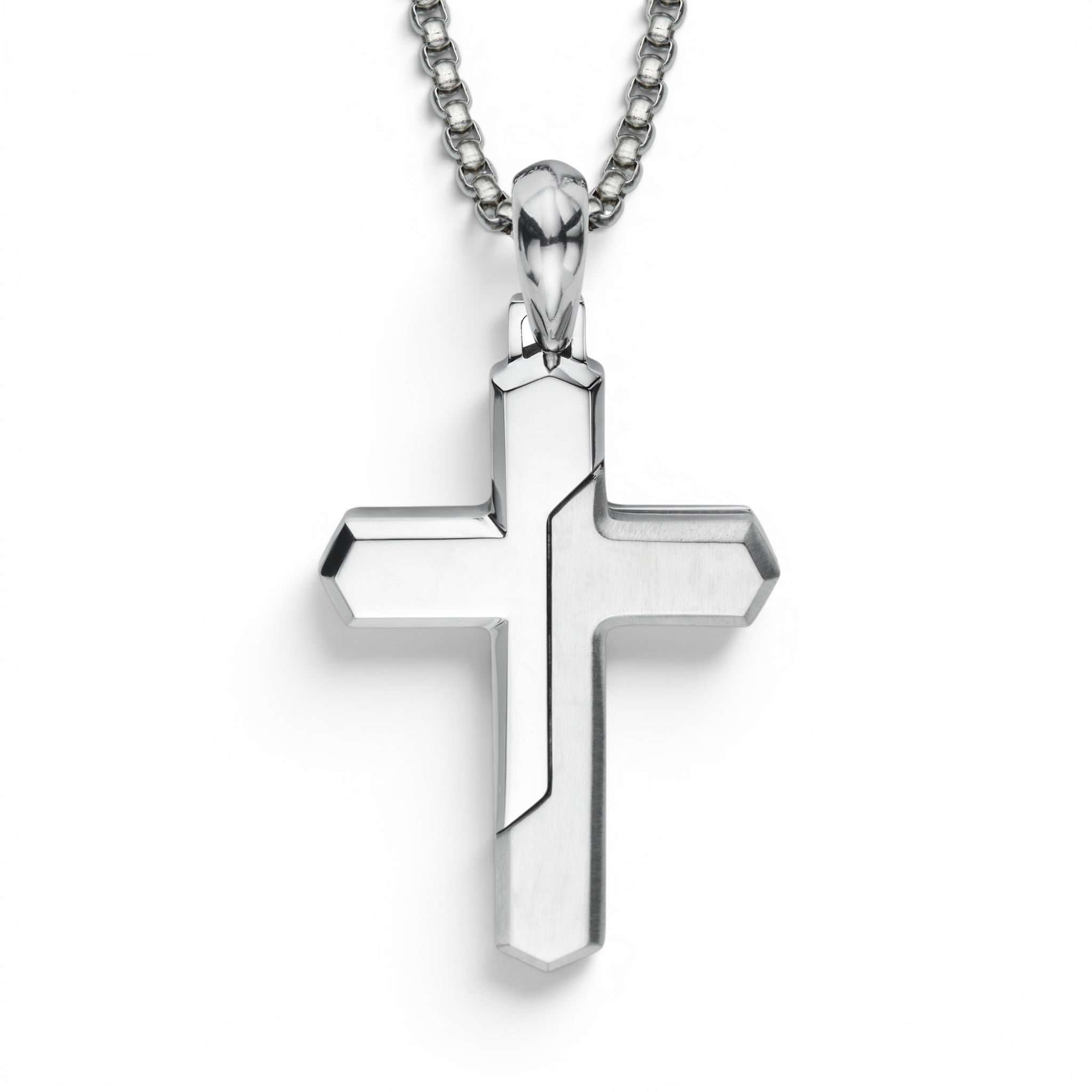 Stainless steel cross pendant with polished and matte two tone finish on 20 inch chain white background