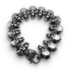 Full view of stainless steel skull bracelet showing detailed skull links