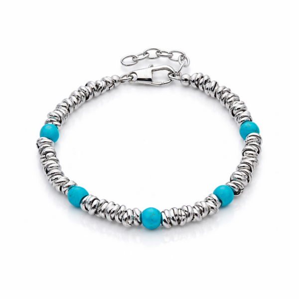 Stainless steel bracelet with turquoise beads and adjustable chain extension