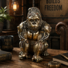 Steampunk gold gorilla ornament displayed in an industrial style man cave setting