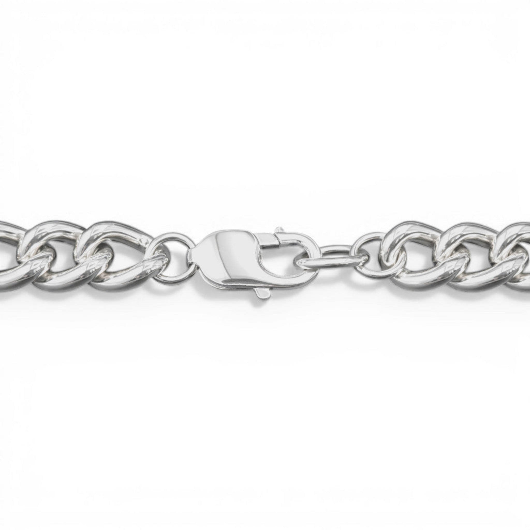Sterling silver curb chain bracelet with clasp detail on a white background