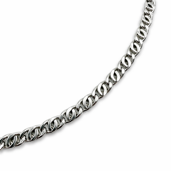 close up of 4mm sterling silver curb chain links showing polished finish