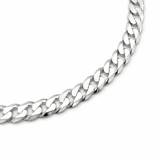 Close up detail of 7mm sterling silver curb chain links showing polished finish