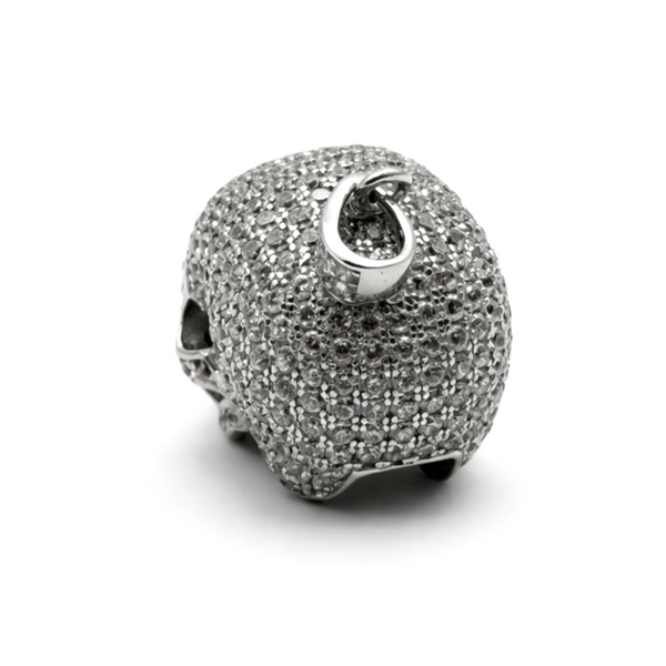 Sterling silver skull pendant encrusted with cubic zirconia rear angle view on a white background