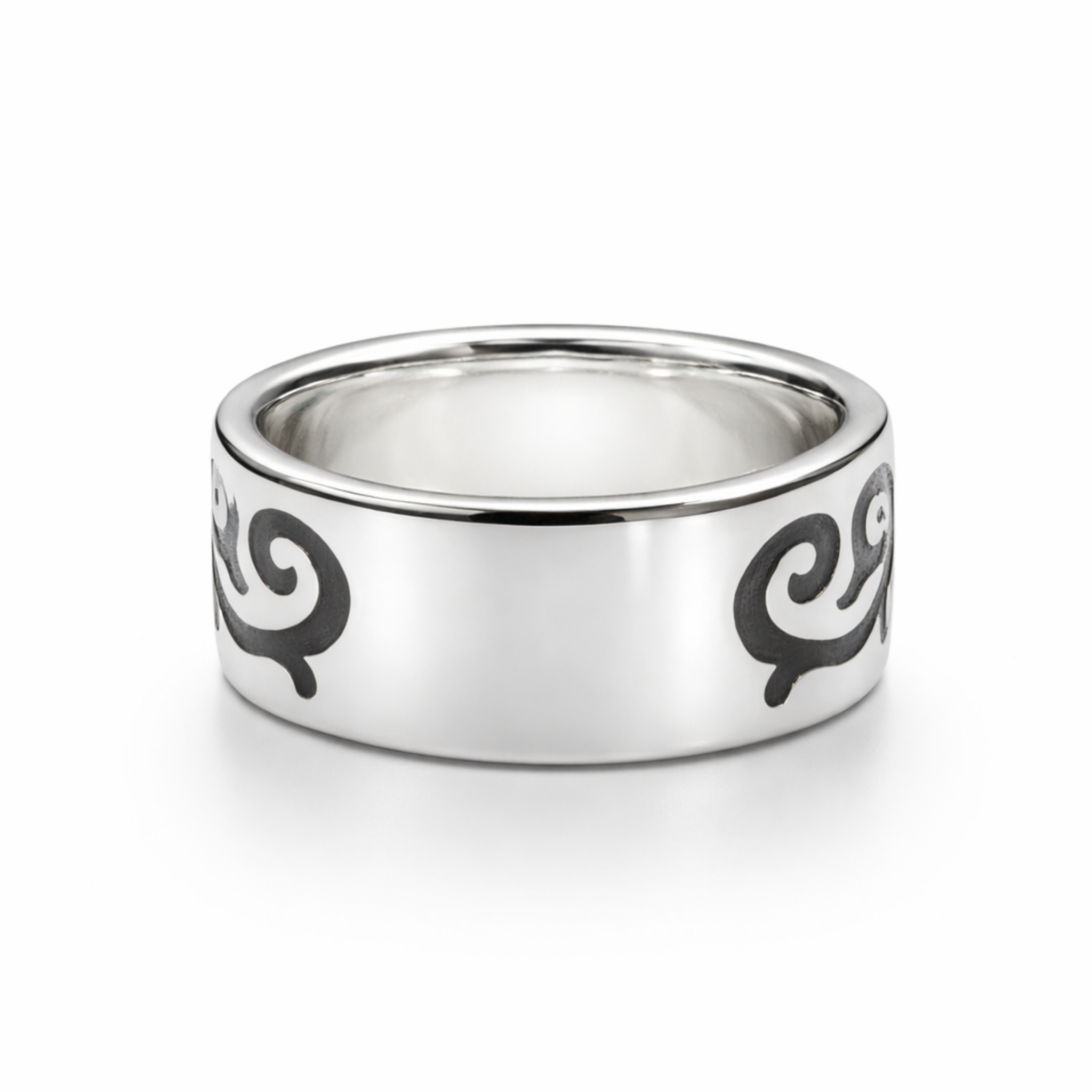 terling silver tribal scroll ring showing inner band and smooth polished interior on white background