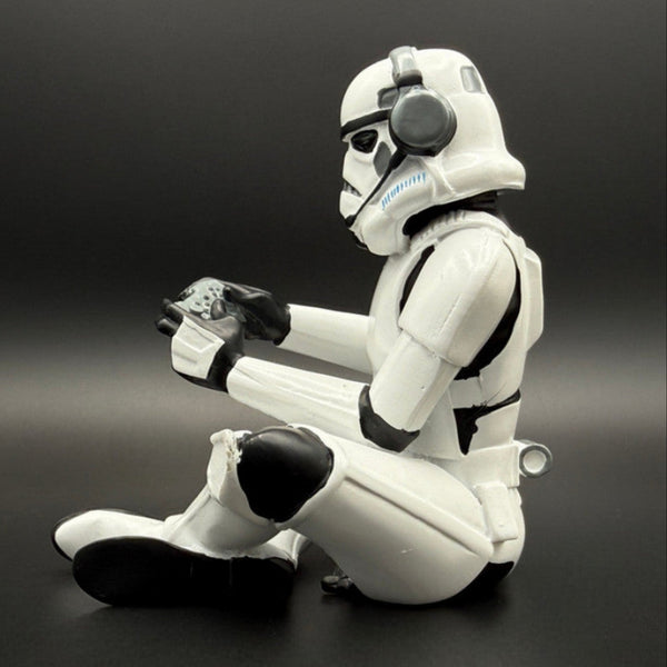 Officially licensed Stormtrooper gamer figurine left side view with headset, controller and blaster detail