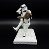 Officially licensed Stormtrooper Pooper Trooper figurine sitting on a toilet reading a newspaper front view