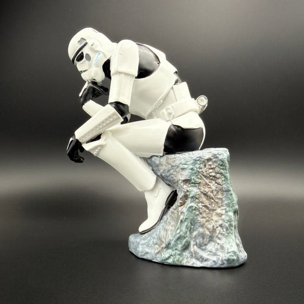 Stormtrooper The Overthinker figurine left side view showing detailed armour and rock base
