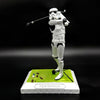 Stormtrooper golf figurine mid-swing front view