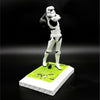 Stormtrooper golf figurine mid-swing side view