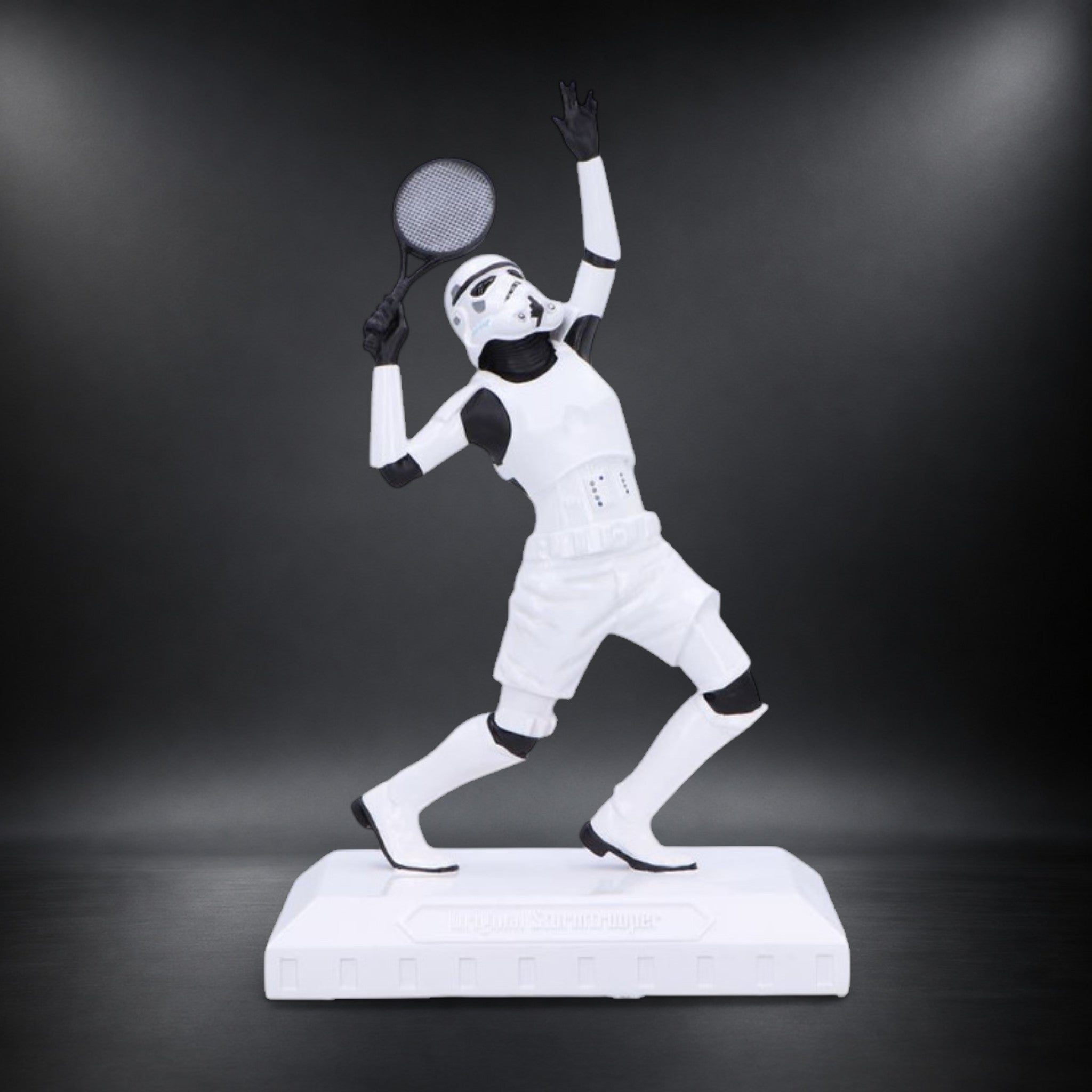 Stormtrooper Serve It! 18.8cm tennis figurine holding a racket in an action serve pose