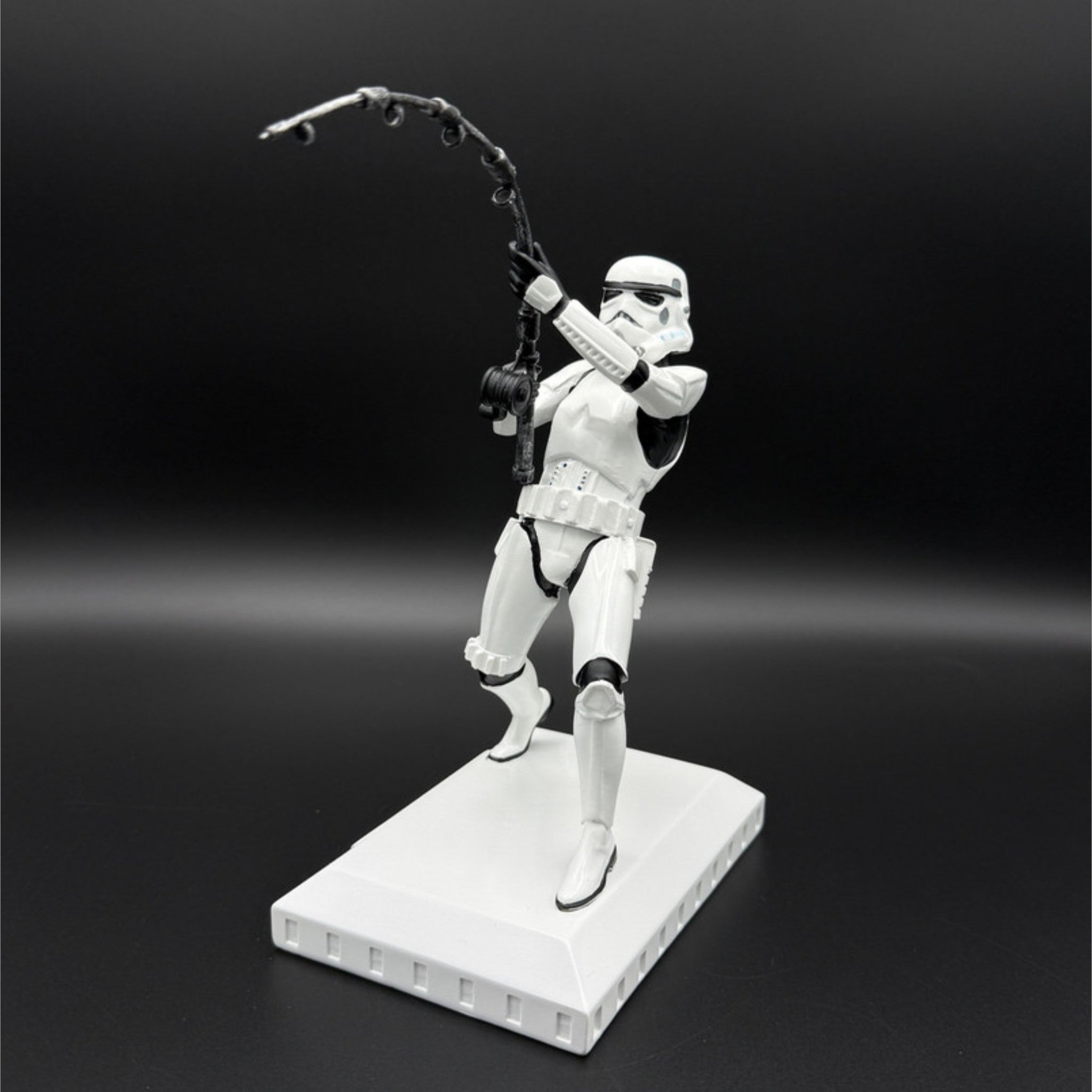 Original Stormtrooper What a Catch fishing figurine 16.5cm front left angle view on display base showing fishing pose and rod