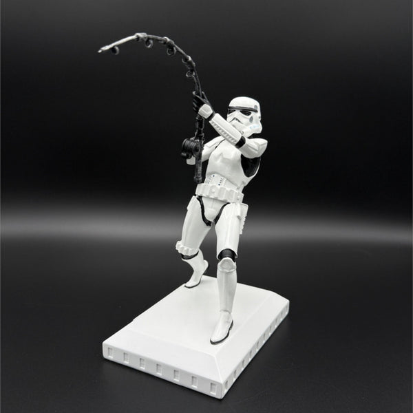 Original Stormtrooper What a Catch fishing figurine 16.5cm front left angle view on display base showing fishing pose and rod