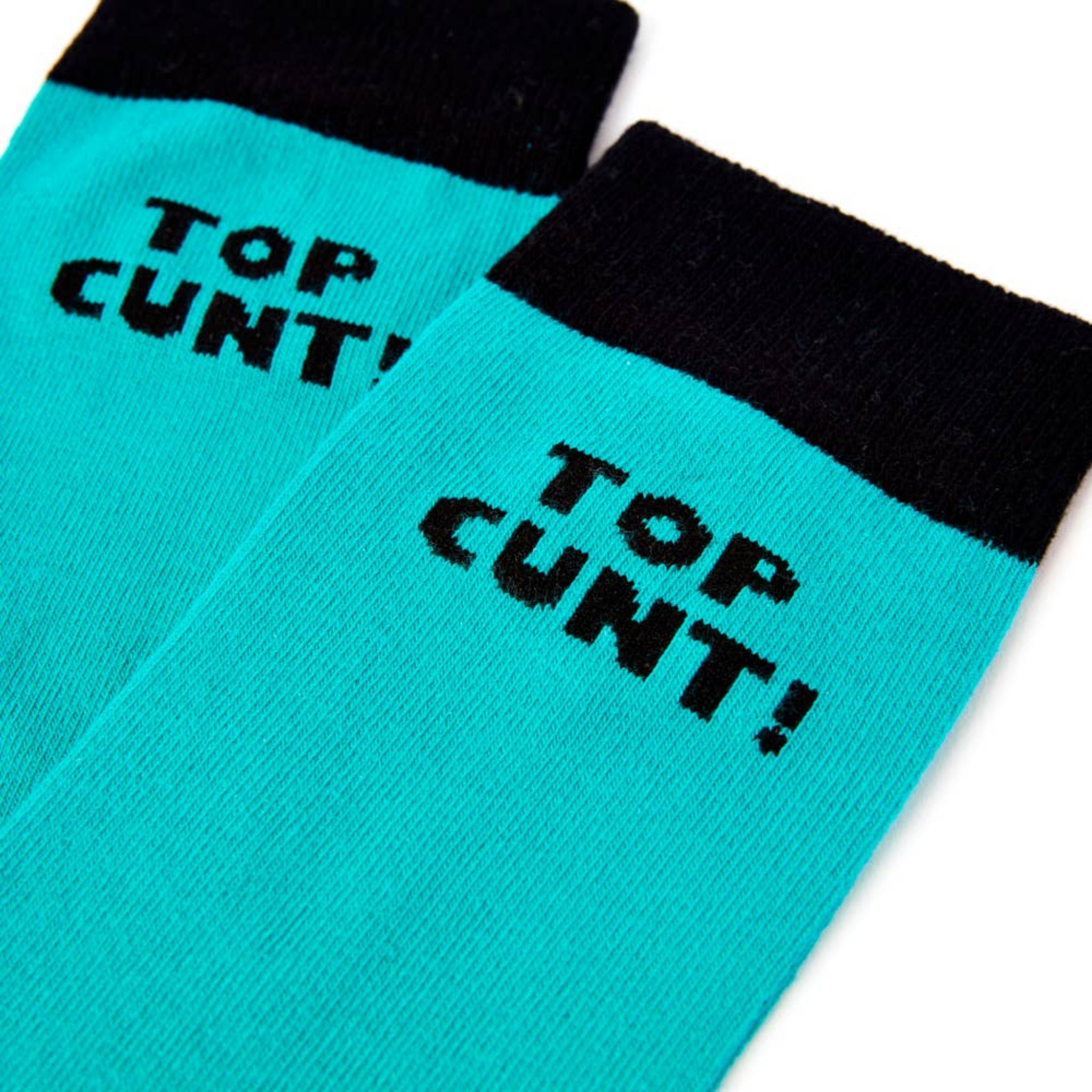 Top Cunt slogan detail on turquoise novelty socks