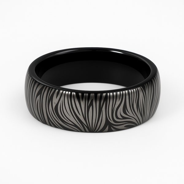 tungsten damascus style ring with dark wave pattern finish on white background