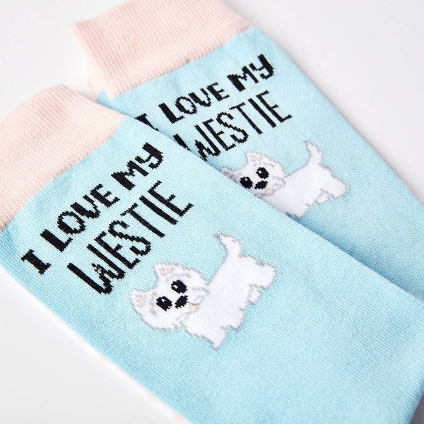 close up of I Love My Westie socks showing dog design and text