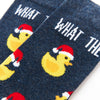 close up of What The Duck socks showing duck pattern and text