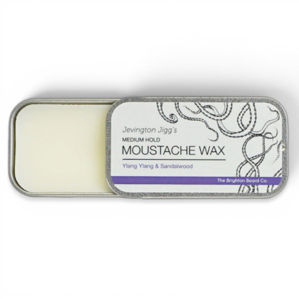 Open tin of ylang ylang sandalwood moustache wax showing product inside